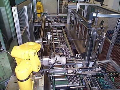 Linea alimentazione transfer con robot industriali